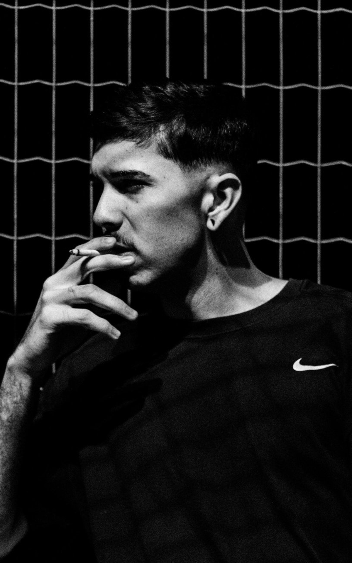 Donni, tatuador do estúdio Grimme